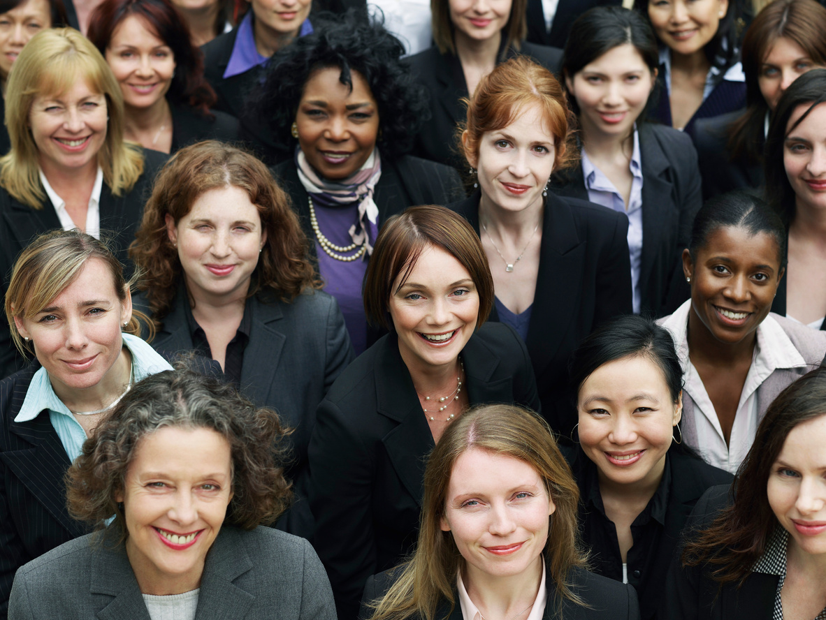 Group of business women looking up portrait elevated view close up